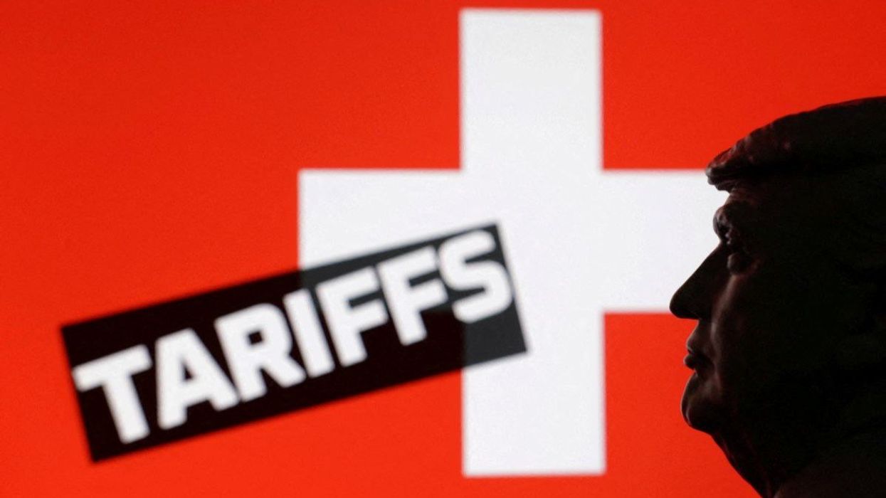 A 3D-printed miniature model of US President Donald Trump in front of the Swiss flag in an illustration taken on July 23, 2025.