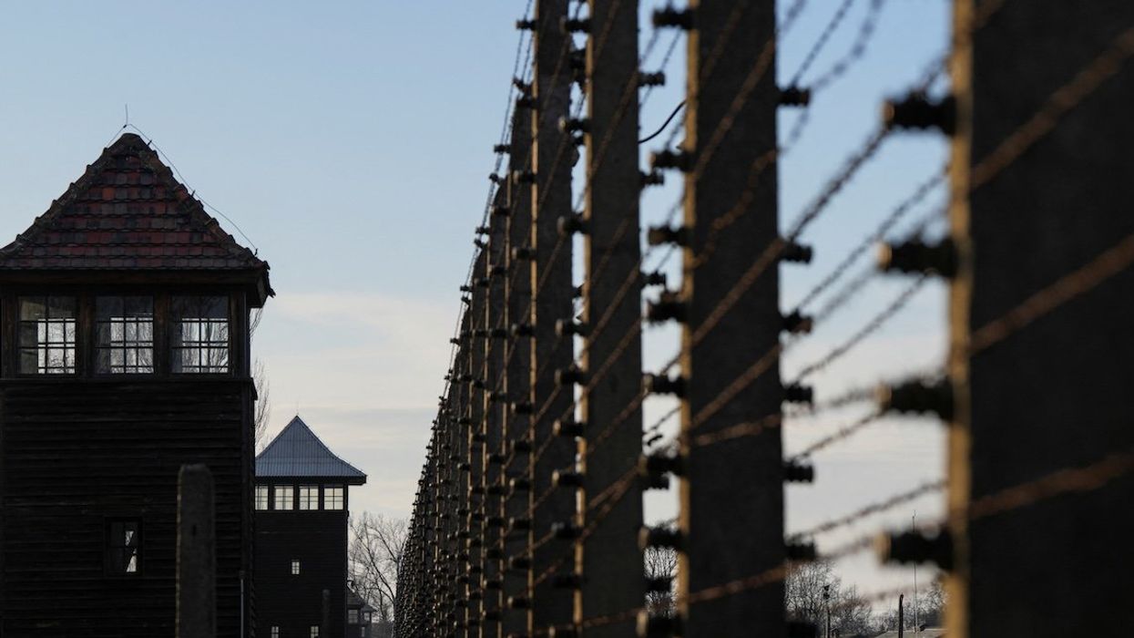 A barbed-wire fence is seen at the site of the former Nazi German concentration and extermination camp Auschwitz-Birkenau prior to the 80th anniversary of the liberation of the camp in Brzezinka, Poland.