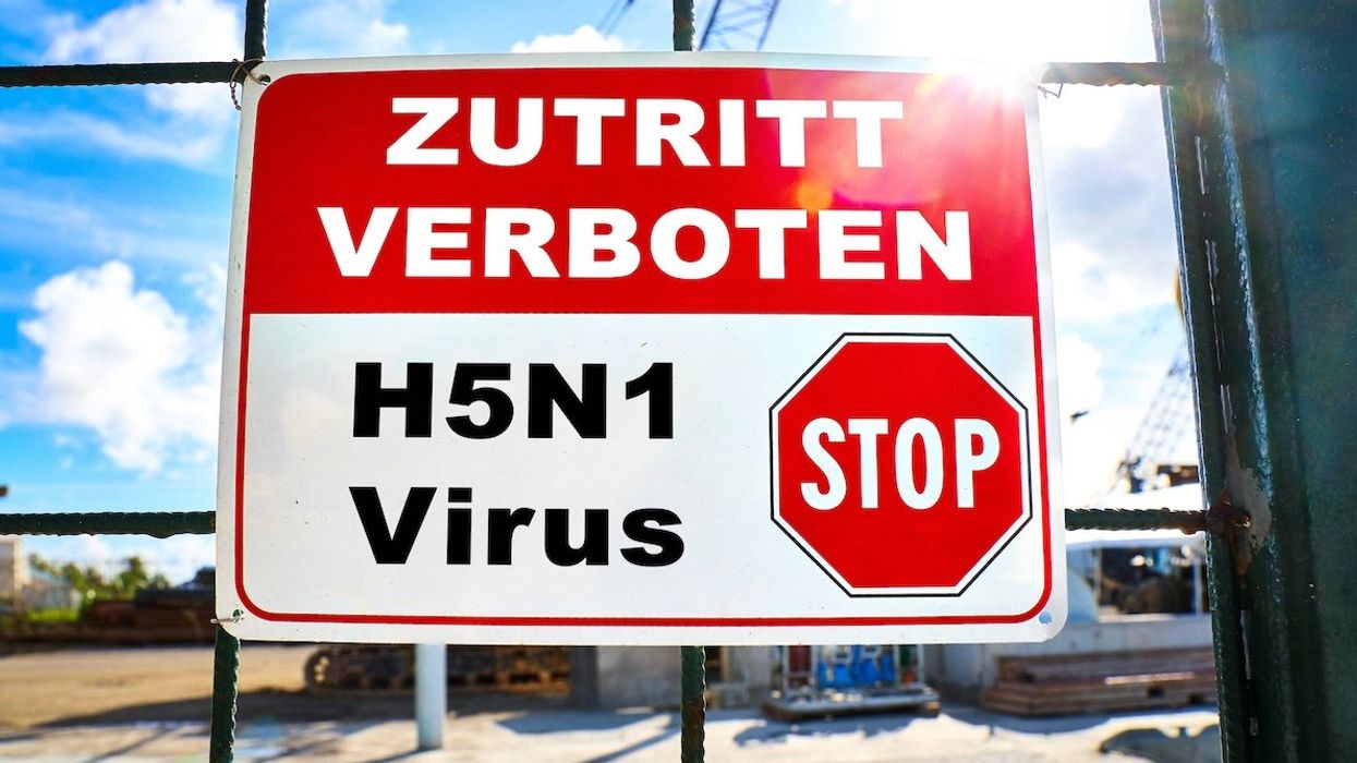 A bird flu warning sign and quarantine zone in Switzerland.