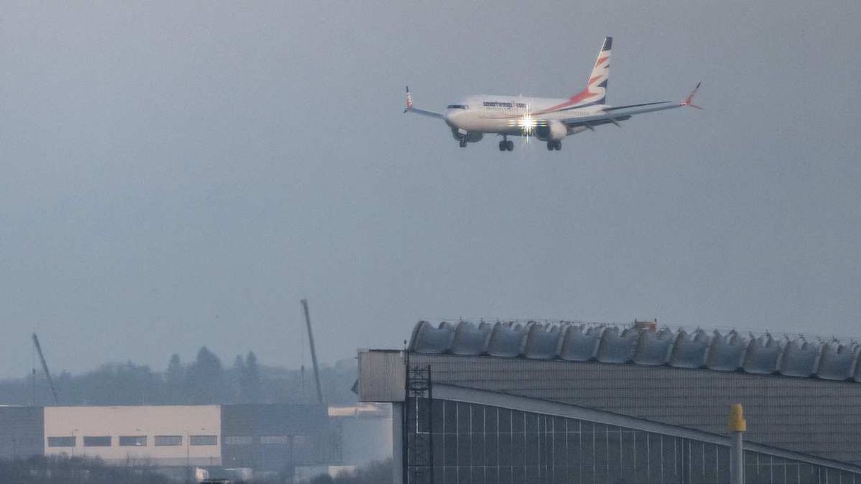 A Boeing 737 Max 8 with Afghans on board lands at Berlin Brandenburg Airport (BER) on December 16, 2025.