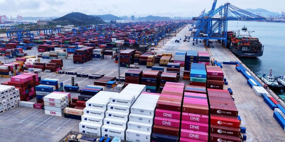 ​A cargo ship is loading and unloading foreign trade containers at Qingdao Port in Qingdao City, Shandong Province, China on May 7, 2025.