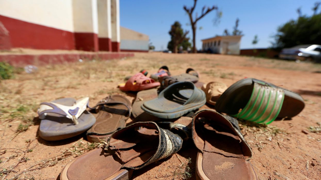 A collection of student footwears left behind after gunmen abducted students at the Government Science school in Kankara, in northwestern Katsina state, Nigeria December 13, 2020.