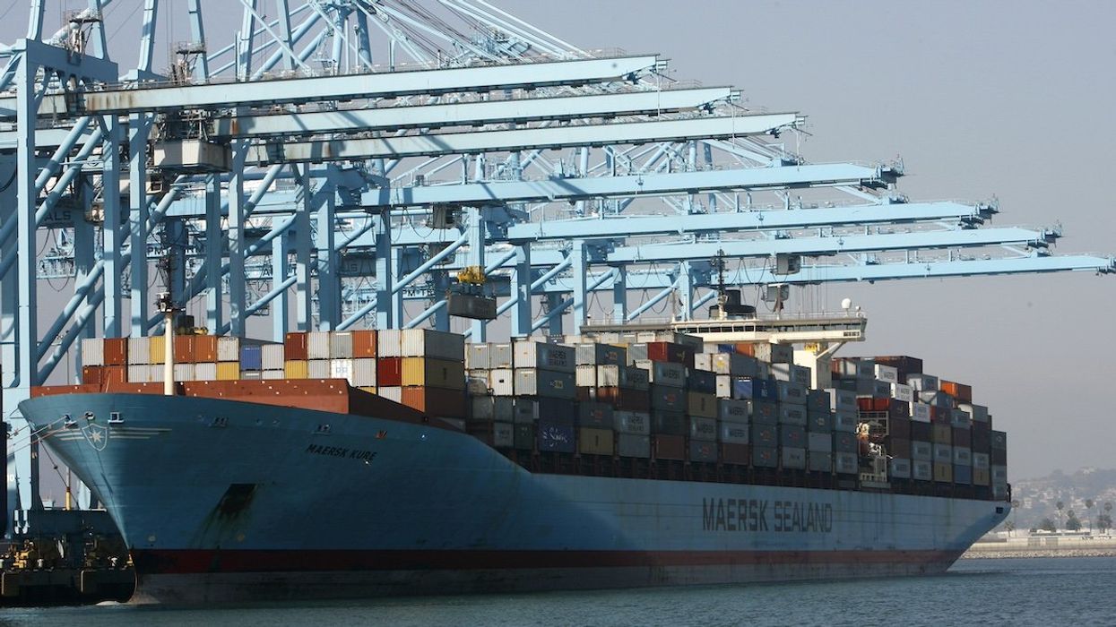 A container ship is docked at the port of Los Angeles on July 2 , 2008.