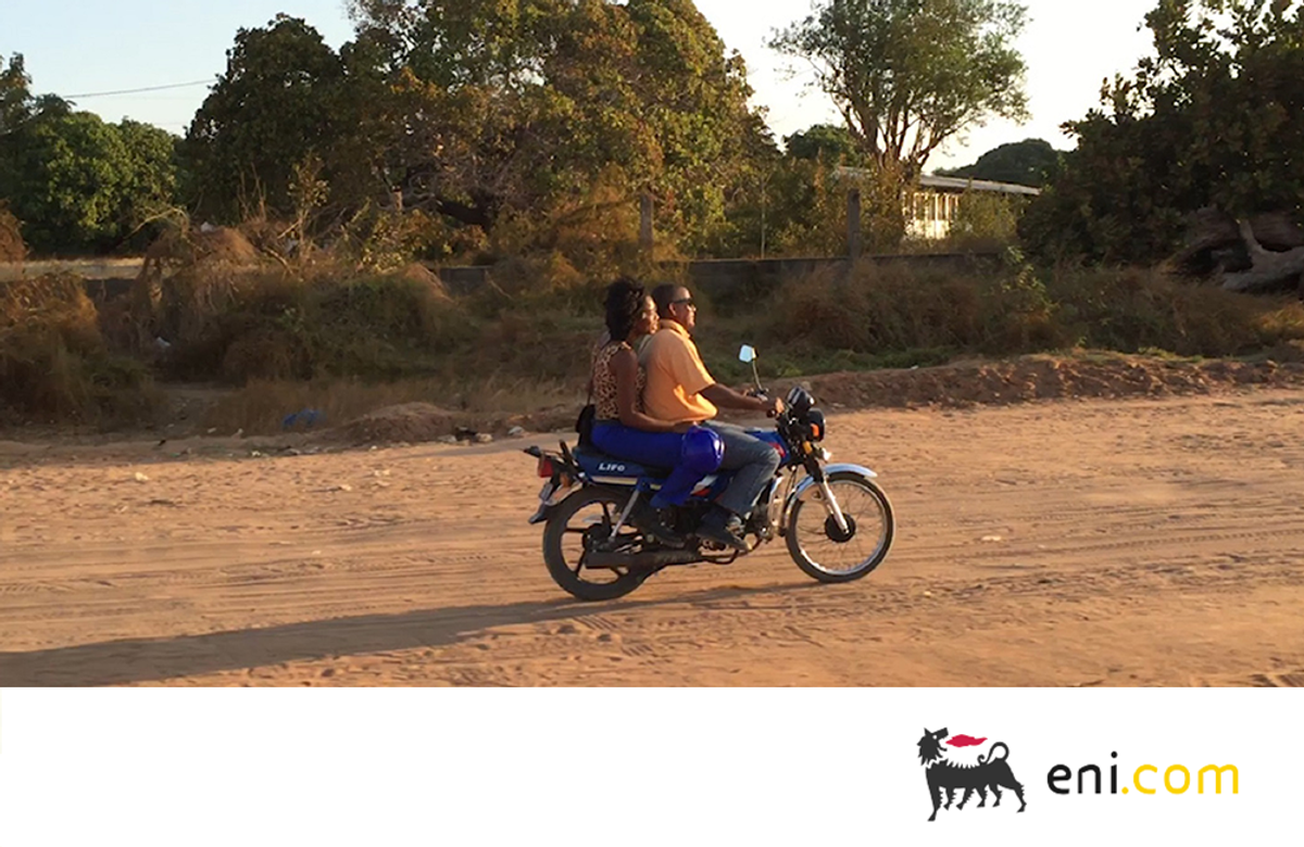 A couple on a motorcycle in Mozambique. Moving forward: powering Mozambique