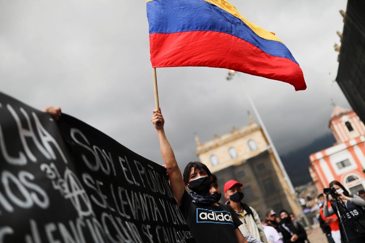 A demonstrator holds a flag during a protest against the tax reform of President Ivan Duque's government in Bogota, Colombia, April 29, 2021.