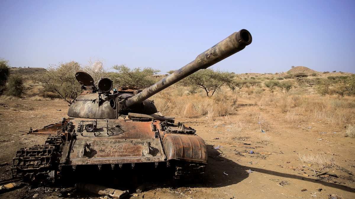 A destroyed tank is seen in a field in the aftermath of fighting between the Ethiopian National Defence Force (ENDF) and the Tigray People's Liberation Front (TPLF) forces in Kasagita town, in Afar region, Ethiopia.