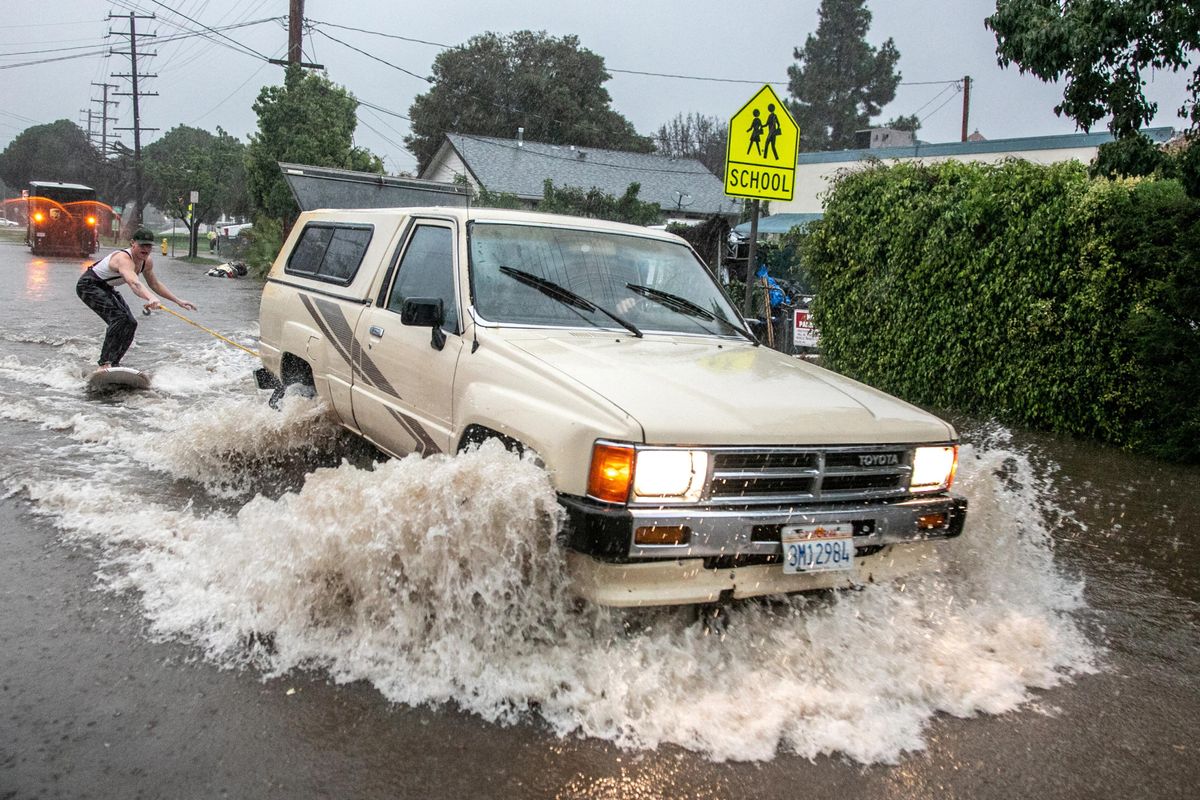 A​ flooded street after the threat of mudslides prompted evacuation orders in east Santa Barbara, California.