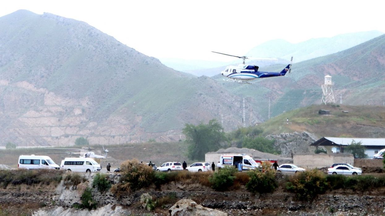 A helicopter carrying Iran's President Ebrahim Raisi takes off, near the Iran-Azerbaijan border, May 19, 2024. The helicopter with Raisi on board later crashed.