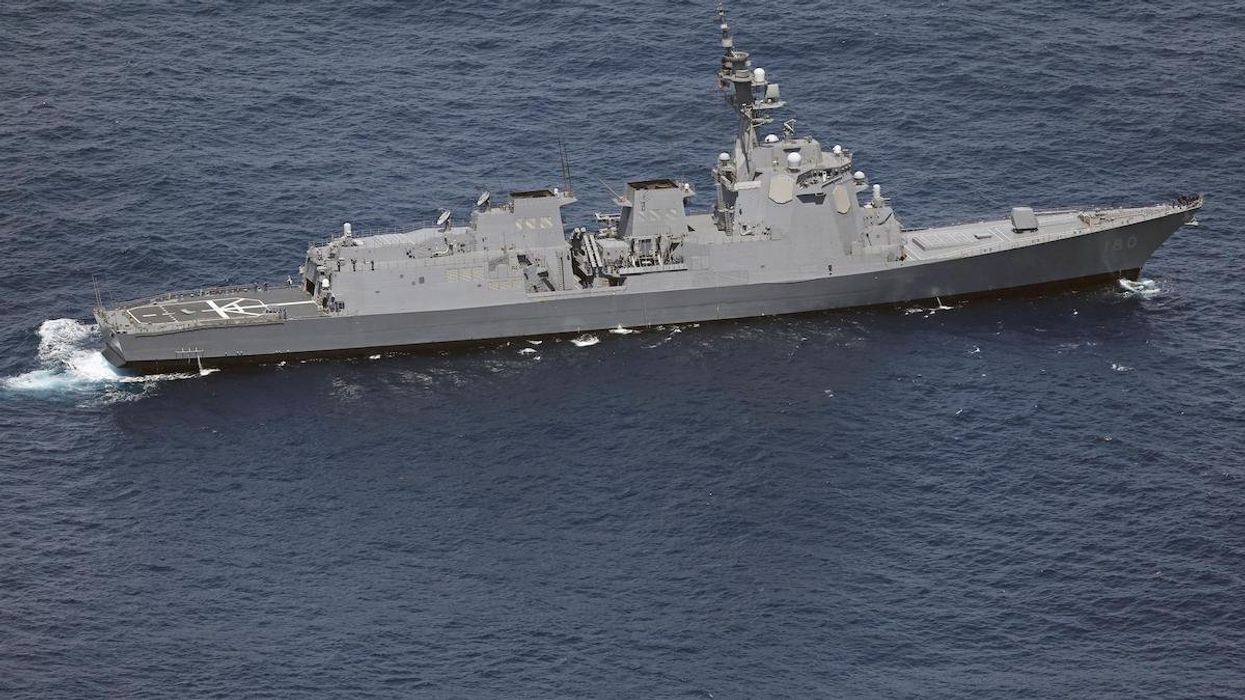 A Japan Maritime Self-Defense Force ship searching for two MSDF helicopters in waters east of Torishima Island in the Izu Island chain in the Pacific after they crashed.