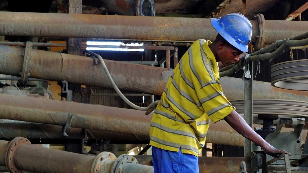 A laborer works at the Congolese state mining company Gecamines' copper concentrator at its Kambove operation in the southern province of Katanga
