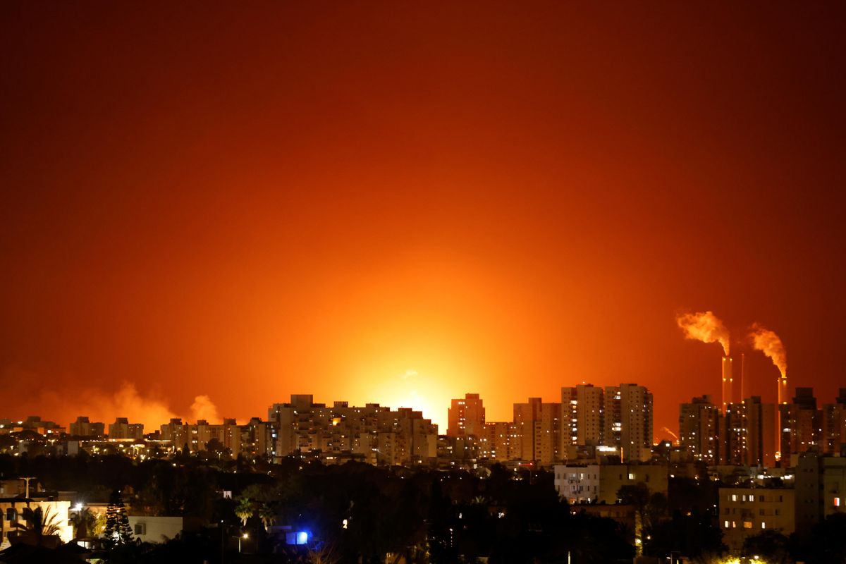 A large fire is seen near the scene of what officials said was a Gaza rocket attack on an Israeli energy pipeline near Ashkelon, Israel, May 11, 2021.