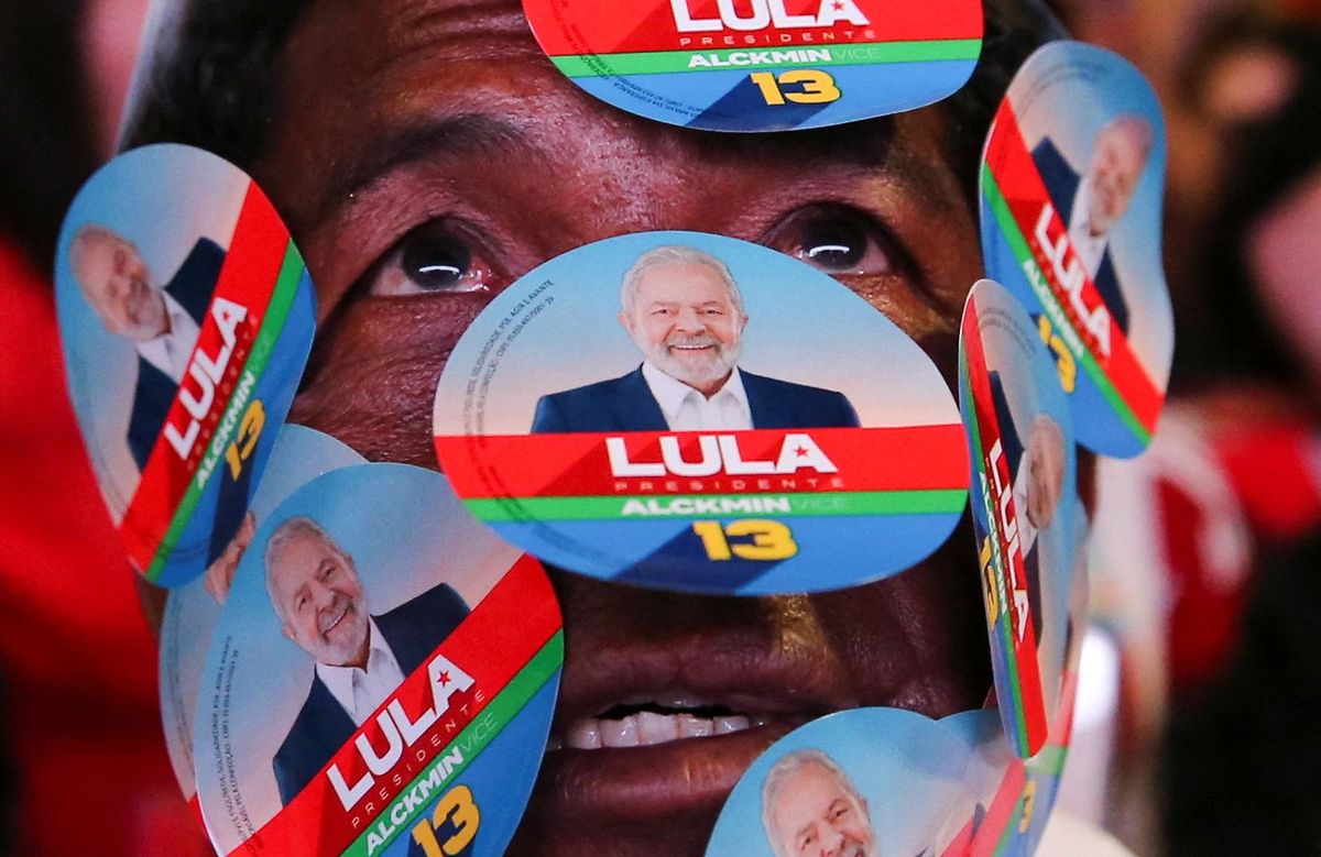 A Lula supporter watches the presidential runoff election results in Brasilia.