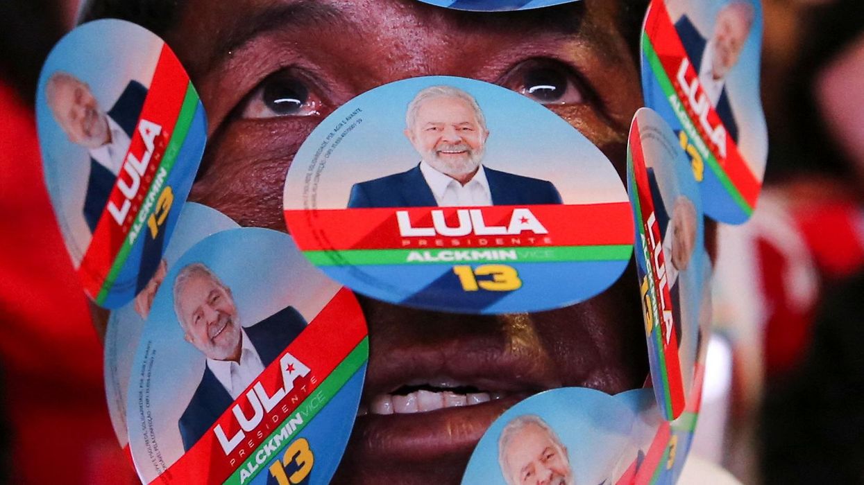 A Lula supporter watches the presidential runoff election results in Brasilia.