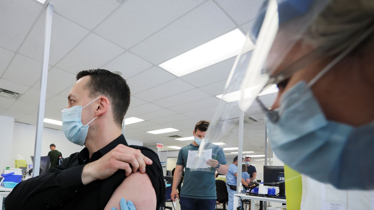 A man is vaccinated at a monkeypox vaccination clinic run by CIUSSS public health authorities in Montreal, Quebec, Canada, June 6, 2022.