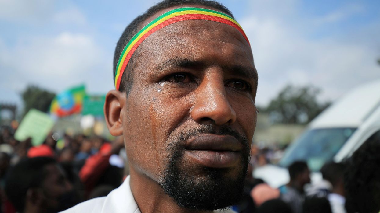 A man reacts during a rally to support the National Defense Force and to condemn the expansion of the Tigray People Liberation Front (TPLF) fighters into Amhara and Afar regional territories at the Meskel Square in Addis Ababa, Ethiopia August 8, 2021.