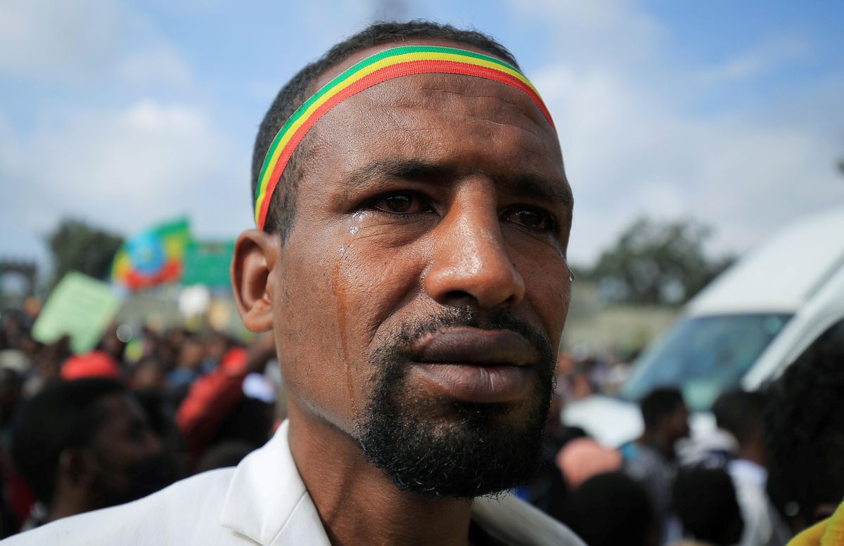A man reacts during a rally to support the National Defense Force and to condemn the expansion of the Tigray People Liberation Front (TPLF) fighters into Amhara and Afar regional territories at the Meskel Square in Addis Ababa, Ethiopia August 8, 2021.