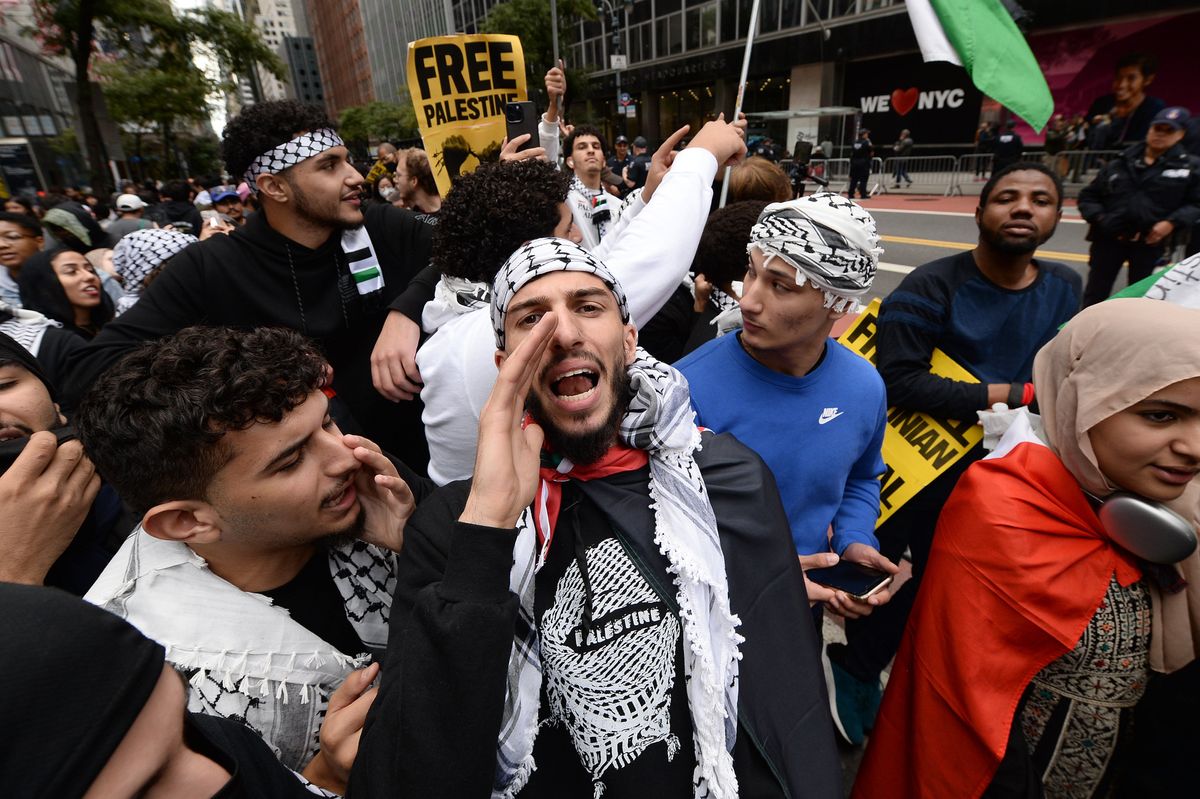 ​A man shouts during a pro-Palestinian rally held across the street from the Consulate General of Israel in, New York City, on Sunday, Oct. 8, 2023. 