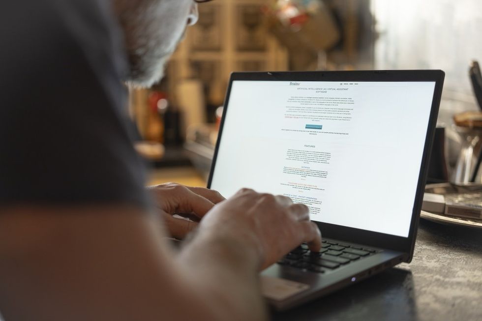 A man uses a chatbot in this illustration photo.