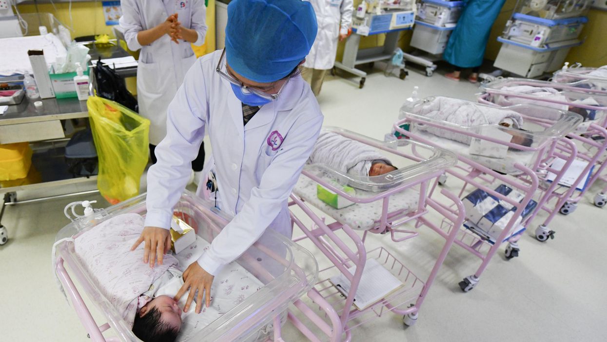 A newborn baby is seen being cared for in the ward of the hospital neonatal care center. The results of the seventh national census of China will be released soon, and some institutions predict that the birth rate will be lower than the death rate for the first time.