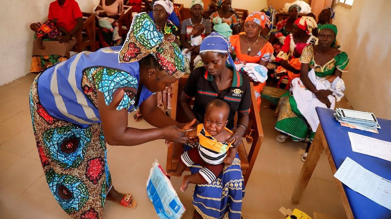 A nurse administers a malaria vaccine to an infant at the health center in Datcheka, Cameroon January 22, 2024.