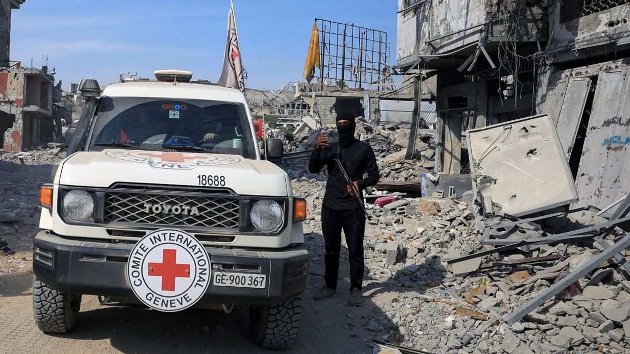 A Palestinian Hamas militant keeps guard in Gaza City, on November 2, 2025.