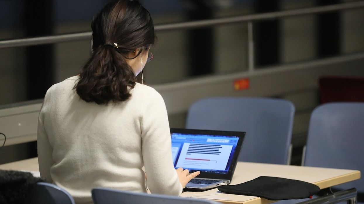 A photo of a student using a chatbot.