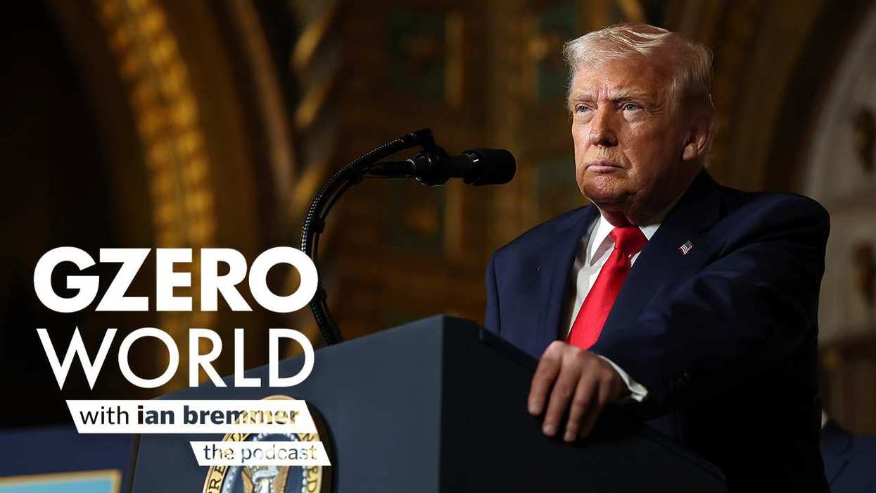 A photo of President Donald Trump standing at a podium with the GZERO World Podcast logo superimposed on top.