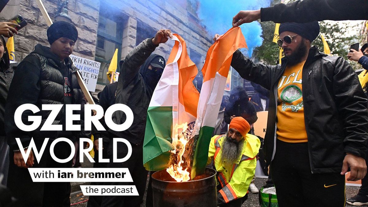 A photo of protesters burning an Indian flag after the assassination of Sikh separatist leader Hardeep Singh Nijjar with the logo of GZERO World with Ian Bremmer - the podcast