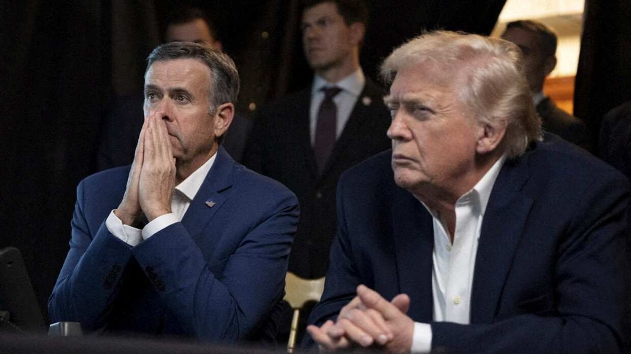 A photograph posted by U.S. President Donald Trump on his Truth Social account shows him sitting next to CIA Director John Ratcliffe as they watch the U.S. military operation in Venezuela from Trump's Mar a Lago resort, in Palm Beach, Florida, U.S., January 3, 2026.