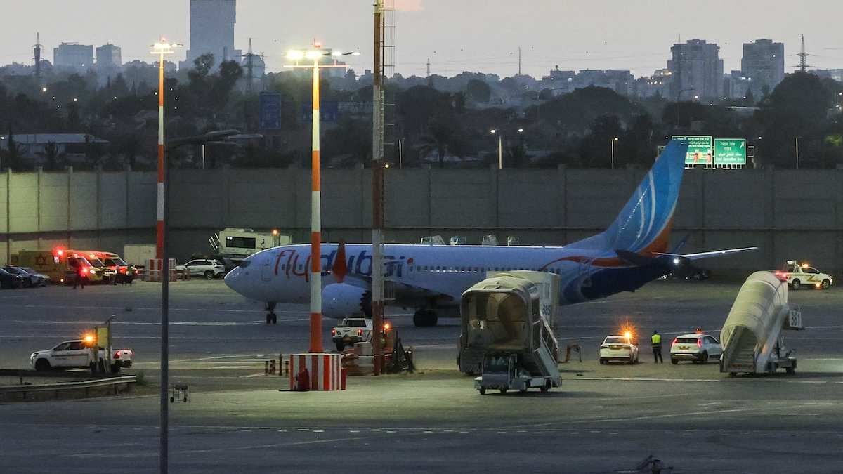 A plane, carrying passengers who were on the FlyDubai aircraft bound for Israel from the United Arab Emirates, which was diverted to Saudi Arabia following an emergency signal, on the tarmac as it arrives at the Ben Gurion International Airport, in Lod, near Tel Aviv, Israel.