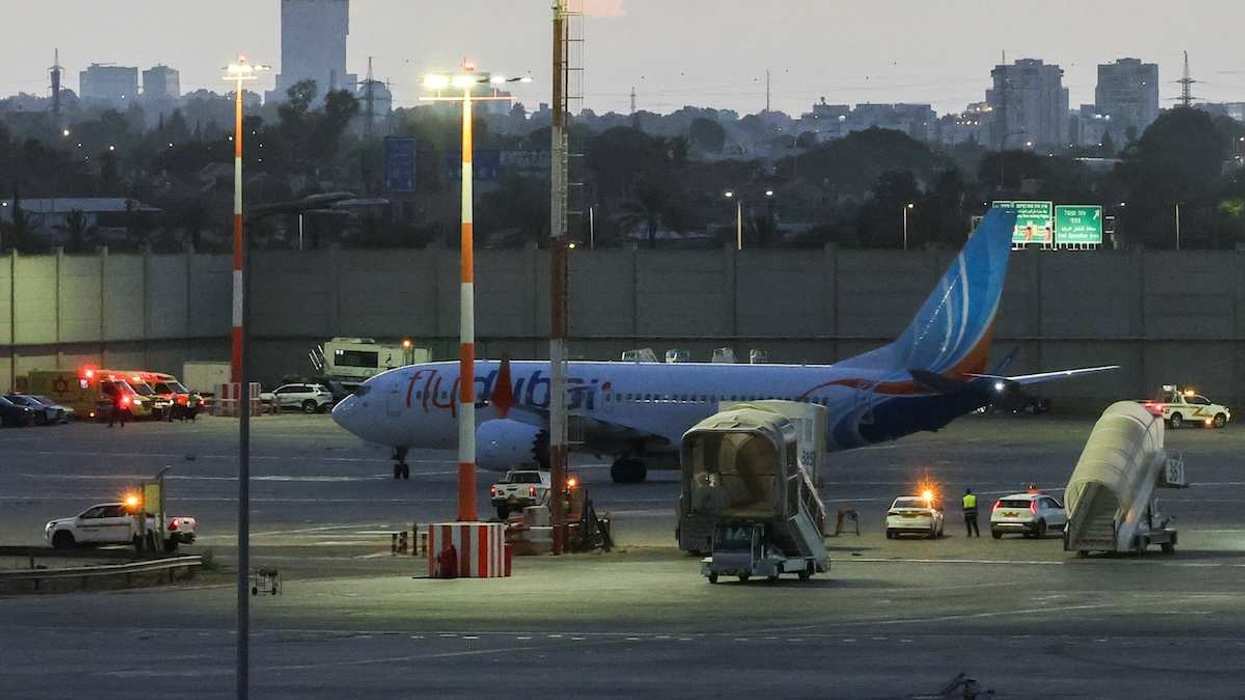 A plane, carrying passengers who were on the FlyDubai aircraft bound for Israel from the United Arab Emirates, which was diverted to Saudi Arabia following an emergency signal, on the tarmac as it arrives at the Ben Gurion International Airport, in Lod, near Tel Aviv, Israel.