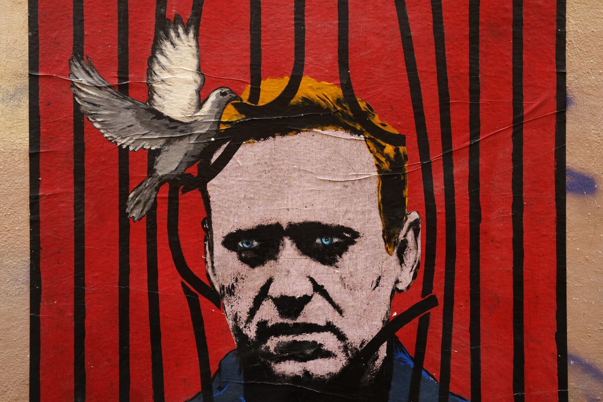 A poster by street artist Harry Greb depicting Russian opposition leader Alexey Navalny in Rome. Reuters