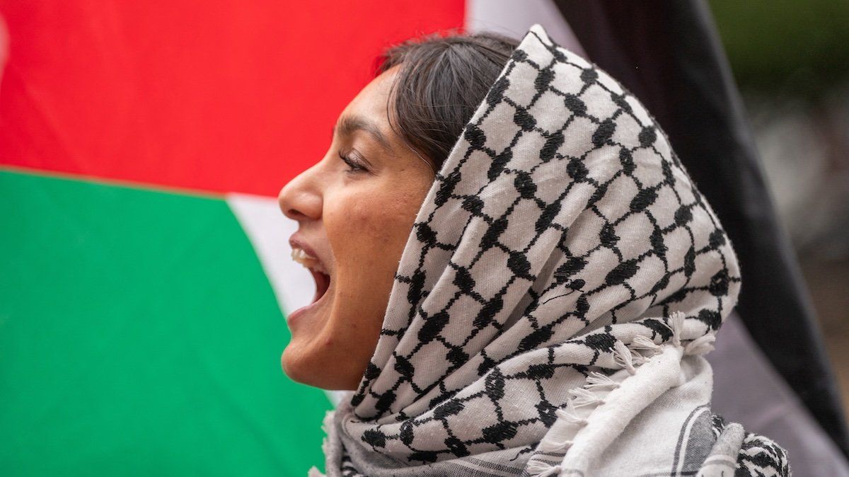 A protester chants slogans in support of Palestinians in Gaza, outside of Columbia University in New York City, U.S., April 24, 2024.