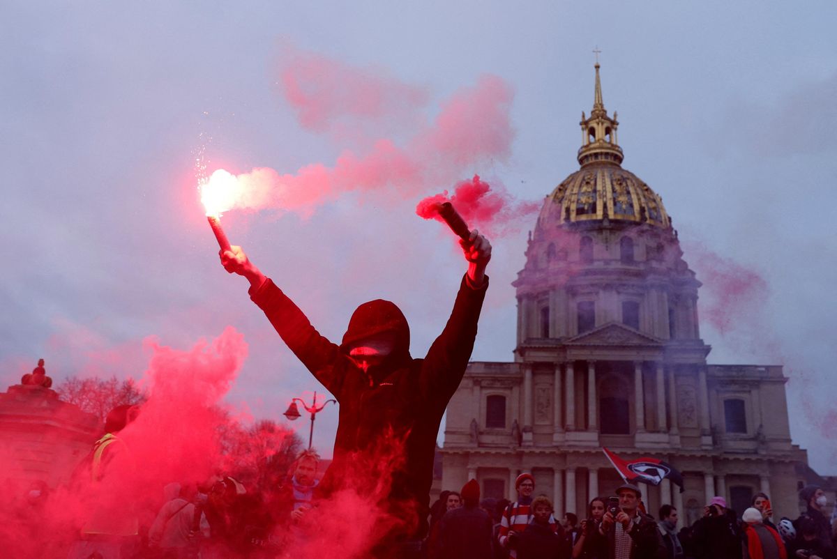 A protester near the Invalides during a demonstration against the government's pension reform plan in Paris