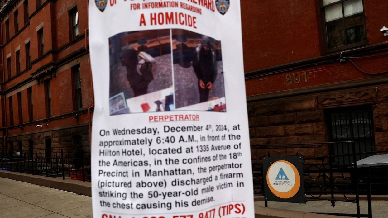 A reward poster for information leading to the arrest of the suspect is seen on the Upper West Side, Manhattan.