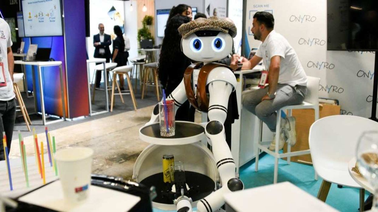 A robot waiter, serving drinks at the Vivatech technology startups and innovation fair, in Paris, on May 24, 2024.