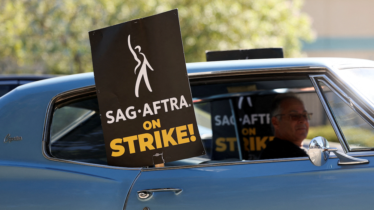 A SAG-AFTRA placard is placed inside a car in Burbank, California, during an earlier strike in 2023.