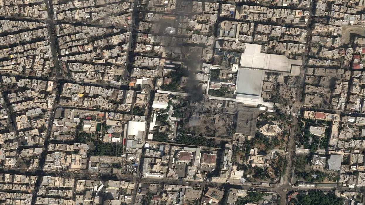 A satellite image shows black smoke rising and heavy damage at Iranian Supreme Leader Ayatollah Ali Khamenei's compound in Tehran, Iran, on February 28, 2026.
