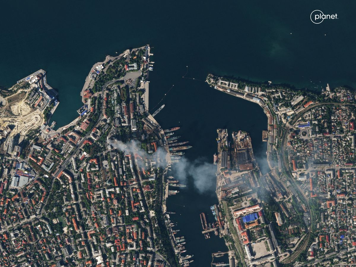A satellite image shows smoke billowing from a Russian Black Sea Navy HQ after a missile strike, as Russia's invasion of Ukraine continues, in Sevastopol, Crimea, September 22, 2023. 