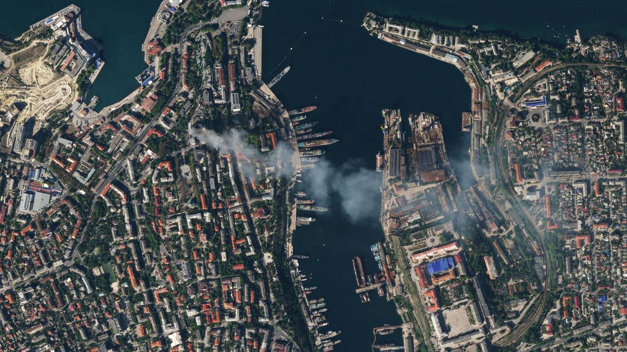 A satellite image shows smoke billowing from a Russian Black Sea Navy HQ after a missile strike, as Russia's invasion of Ukraine continues, in Sevastopol, Crimea, September 22, 2023.