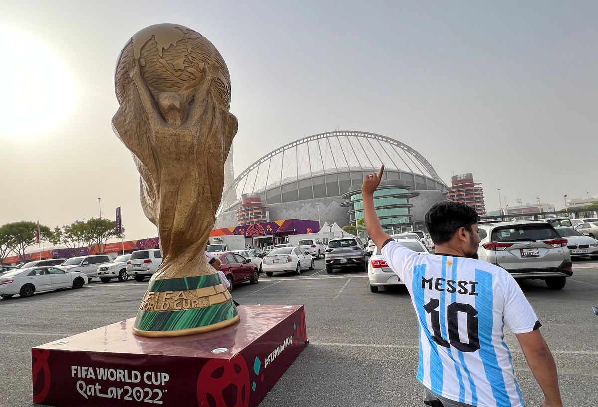 A sculpture of the World Cup trophy is pictured in front of Khalifa International Stadium in Doha.