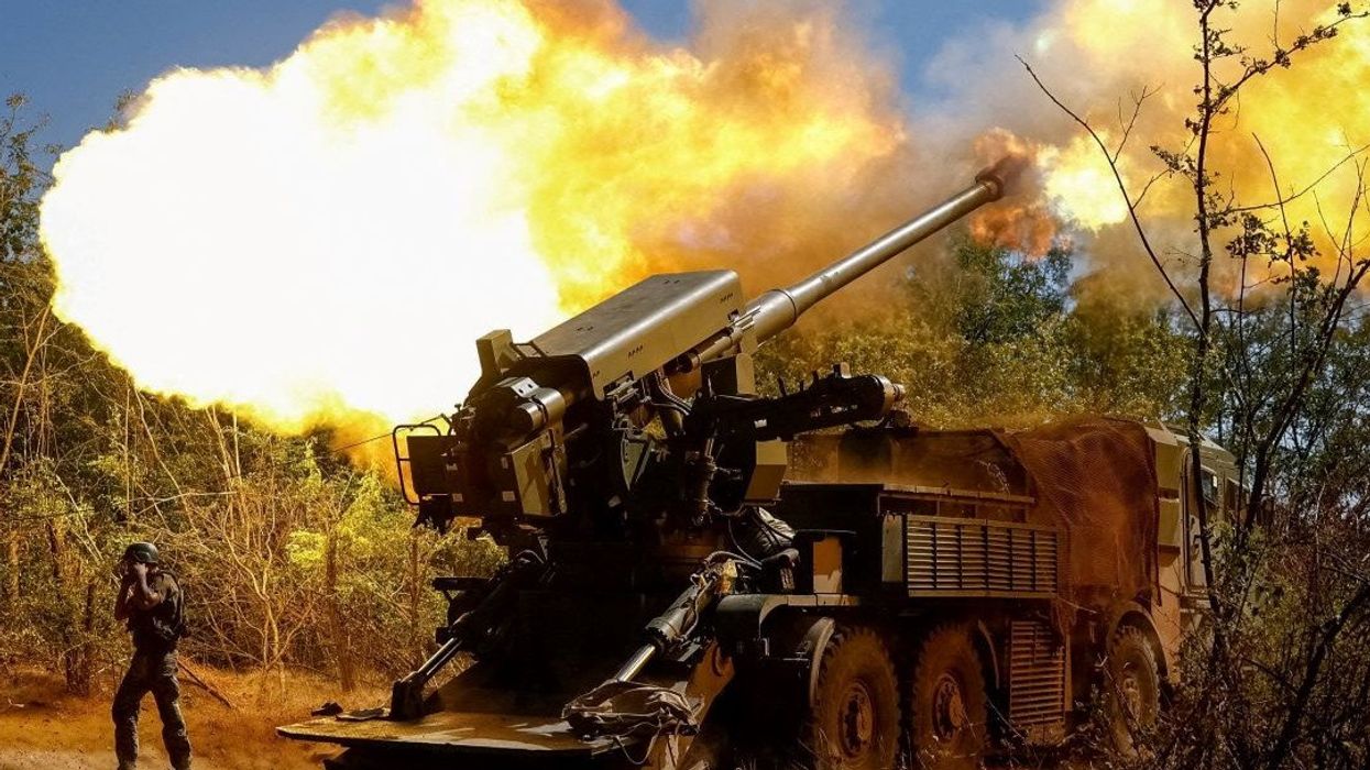 A service member of the 44th Separate Artillery Brigade of the Ukrainian Armed Forces fires a 2S22 Bohdana self-propelled howitzer towards Russian troops near a front line, amid Russia's attack on Ukraine, in Zaporizhzhia region, Ukraine August 20, 2025.
