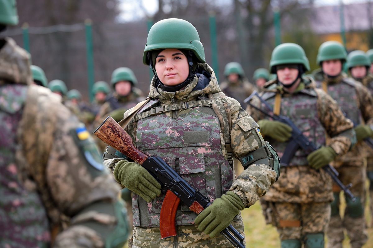 A servicewoman holds a rifle during the graduation ceremony of the officers of the Armed Forces of Ukraine of the Hetman Petro Sahaidachnyi National Academy of Land Forces, in the Lviv Region of western Ukraine. 