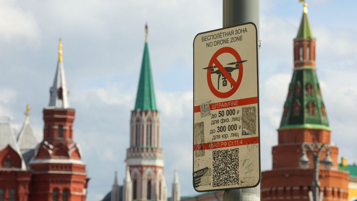 A sign prohibiting drones flying over Red Square is on display near the State Historical Museum and the Kremlin wall in central Moscow, Russia.