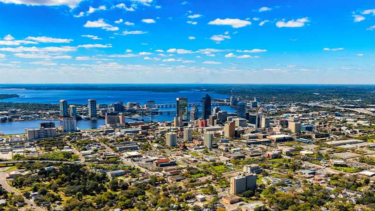 A skyline view of a city on a river