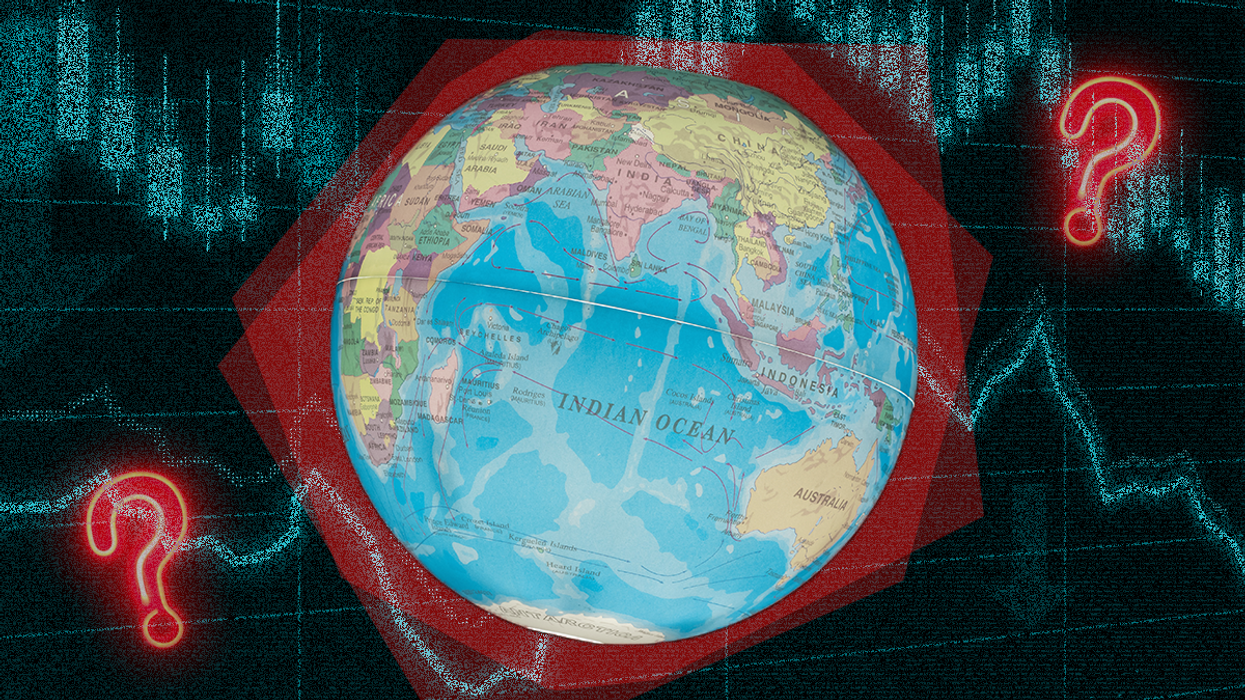 A spinning globe with a graph behind it showing ups and downs