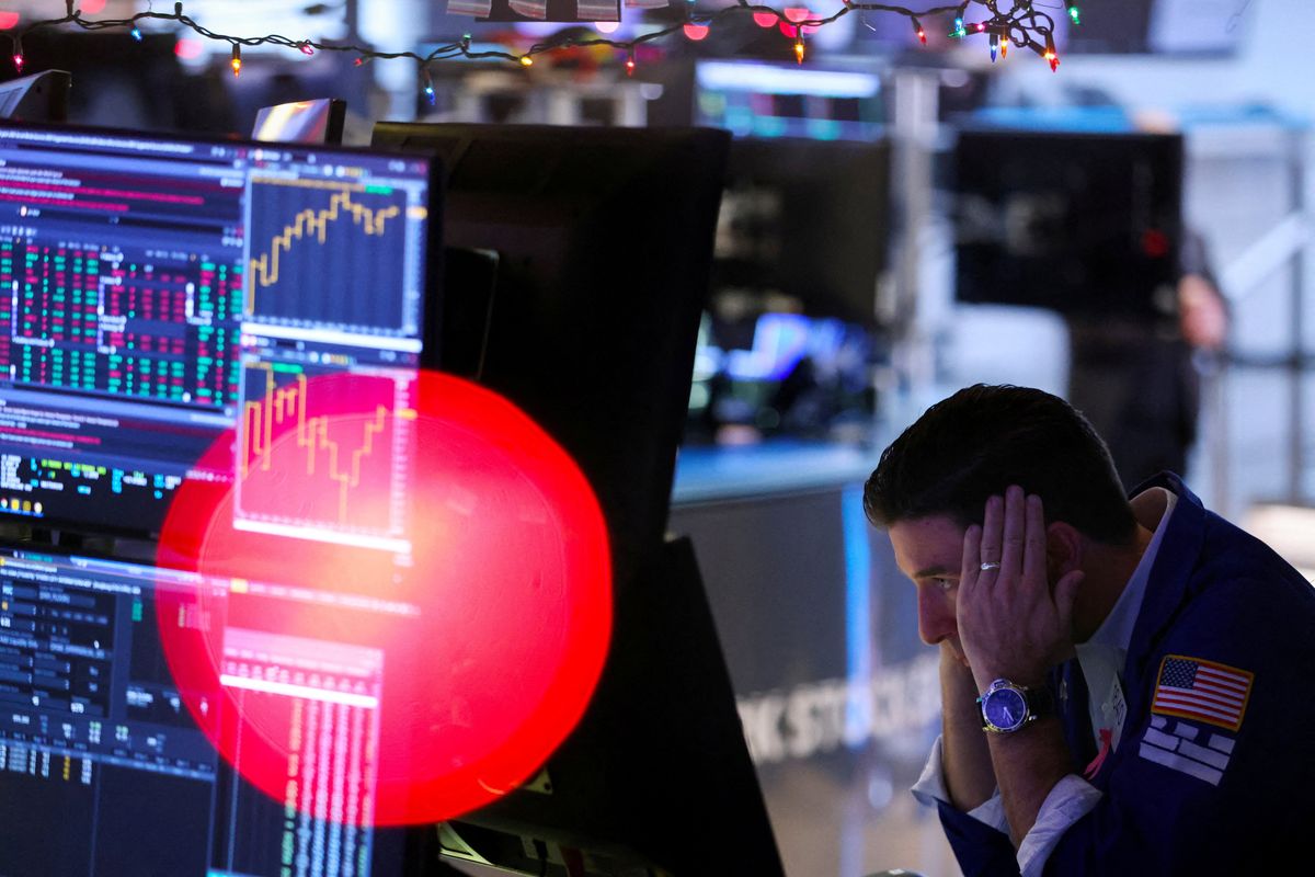 A trader works on the trading floor at the New York Stock Exchange.