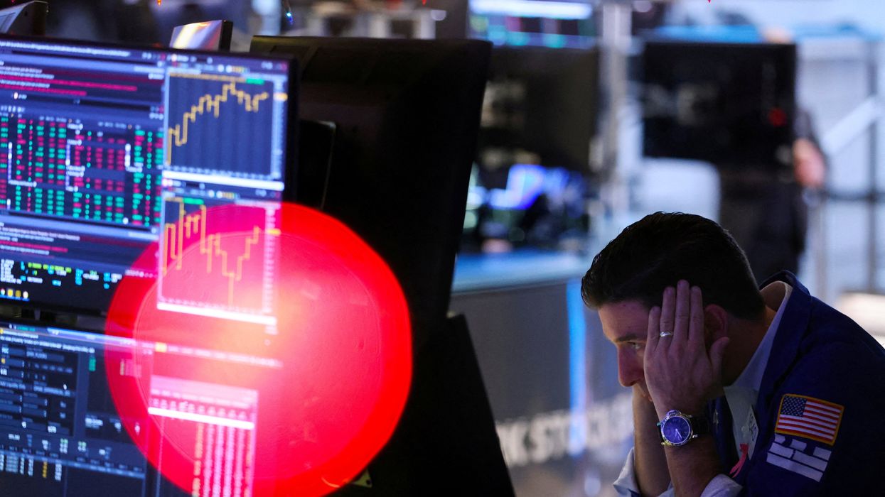 A trader works on the trading floor at the New York Stock Exchange.