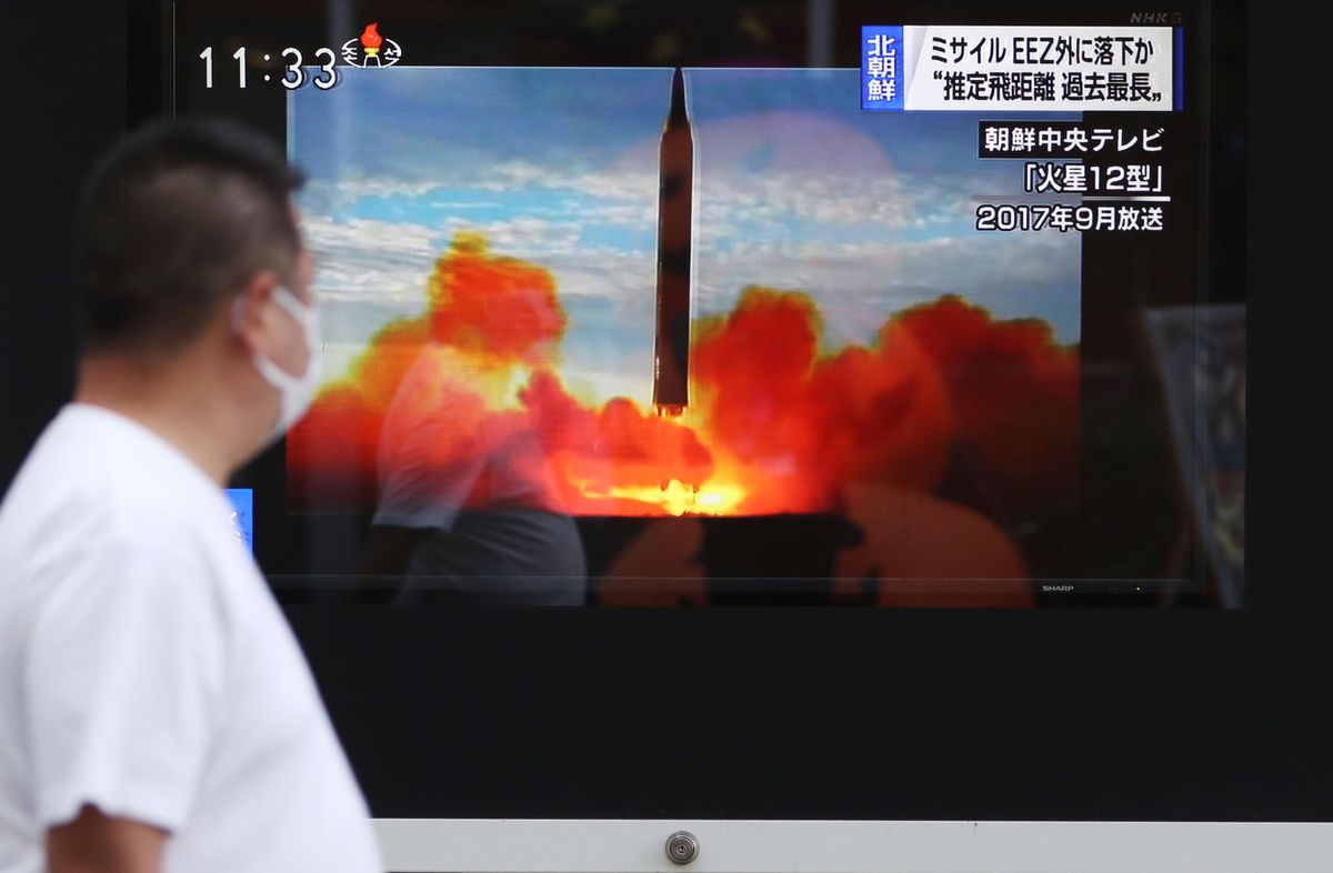 A TV monitor announces the news of North Korea's ballistic missile launch in Chiyoda Ward, Tokyo.