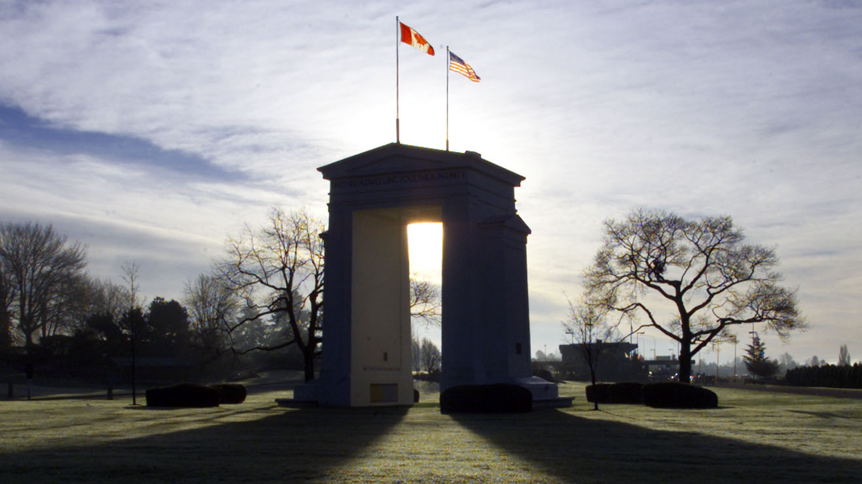 A US-Canada border crossing and monument.